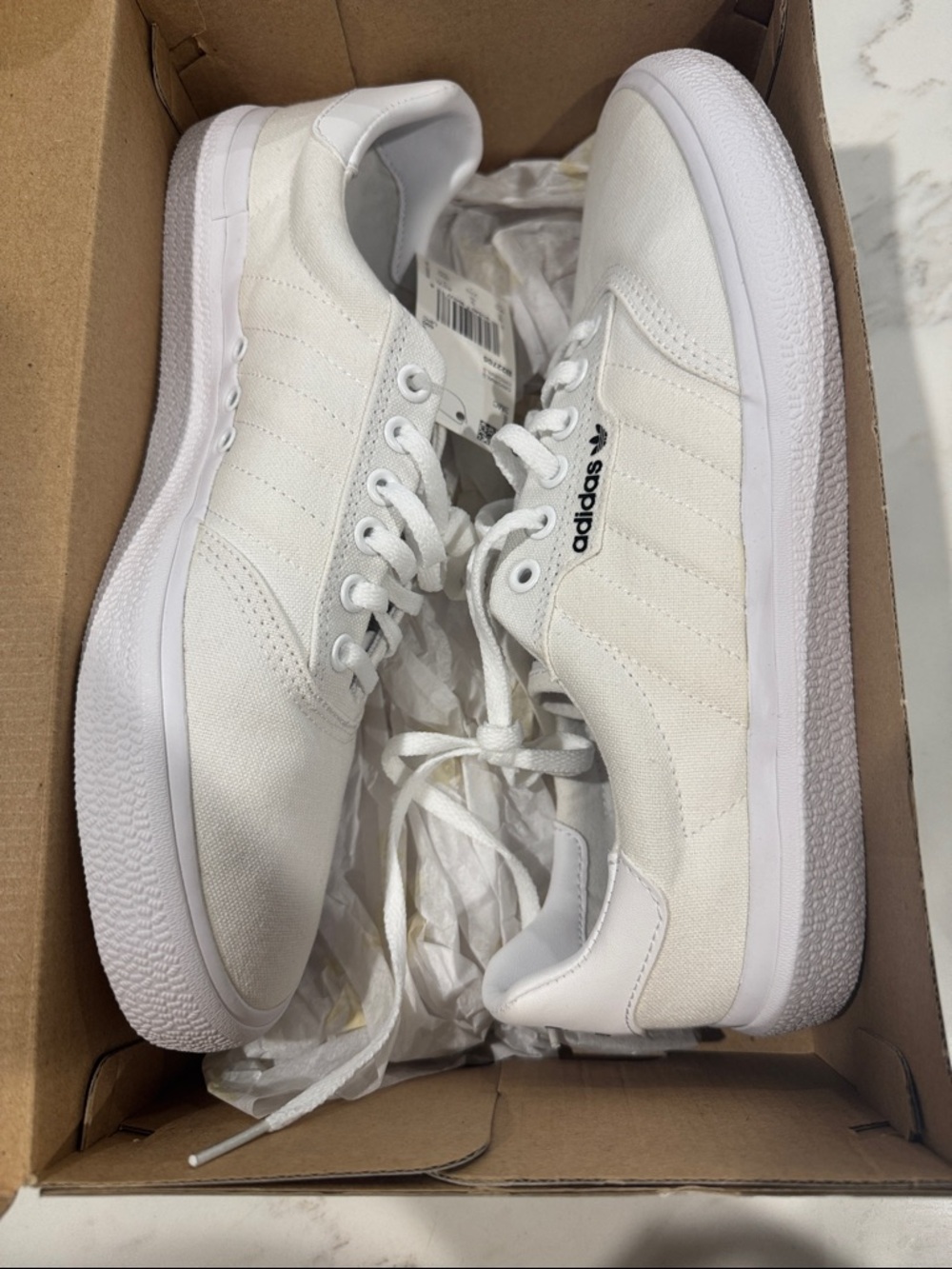 adidas All-White Low-Top Canvas Sneakers